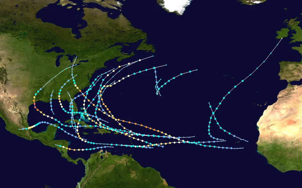 Satellite map displaying various hurricane paths over the Atlantic Ocean, with colored lines indicating different storm impact routes near North and Carolina. in either North or South Carolina